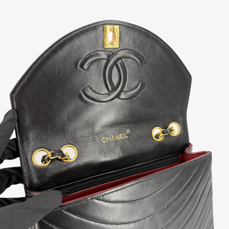 CS004 - CHANEL Vintage Black Lambskin Half Moon Wave Flap Bag
