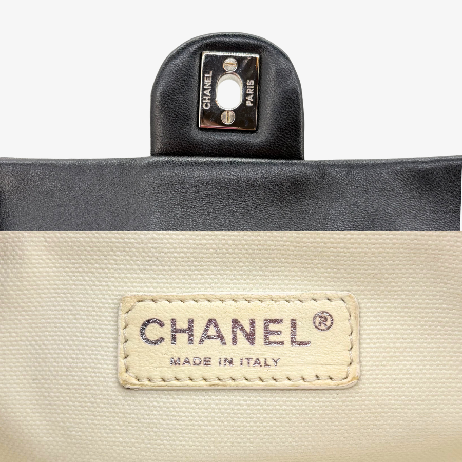 RG367 - CHANEL Black Lmabskin Perforated Flap Bag