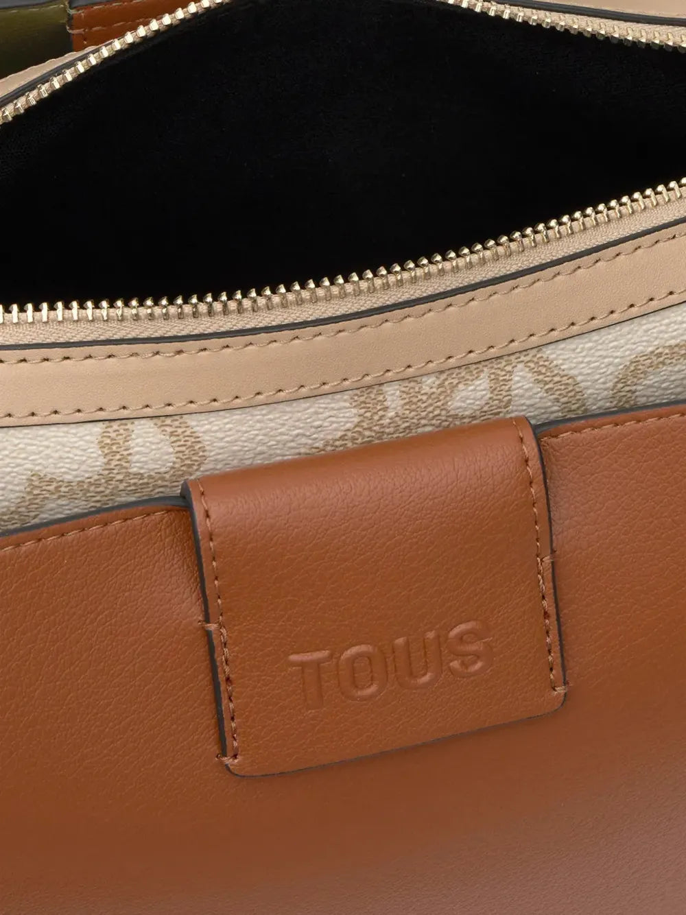 logo-embossed shoulder bag