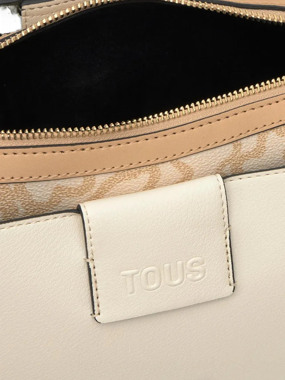 logo-embossed shoulder bag