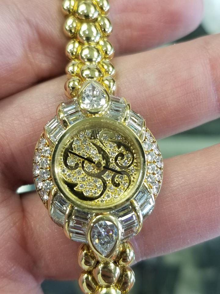 Audemars Piguet Ladies Gold Set With Diamond Baguette Watch Diamond Dial