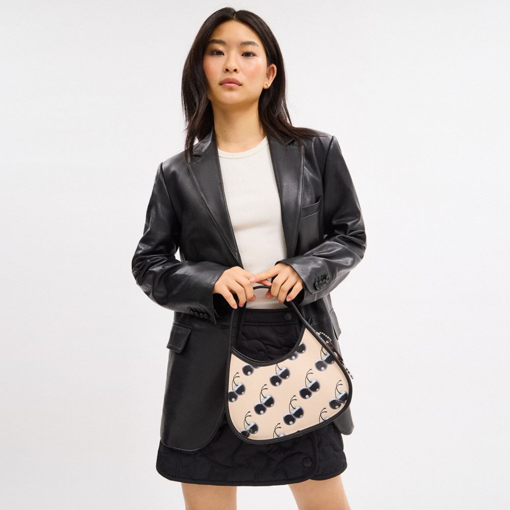 Ergo Bag In Coachtopia Leather With Cherry Print