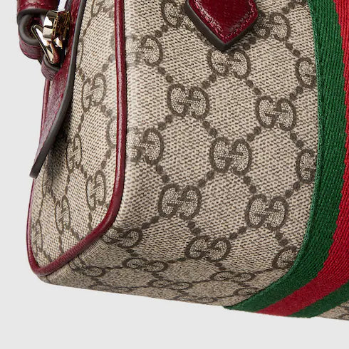 Ophidia mini boston bag