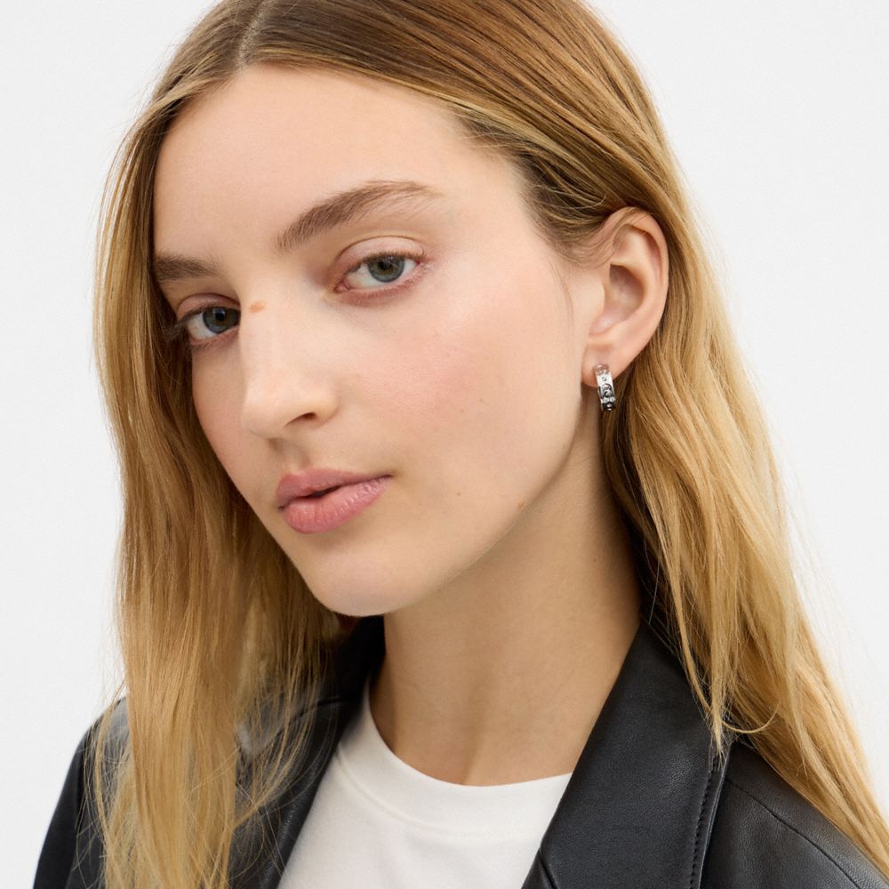 Coach Repeated C Huggie Earrings Silver