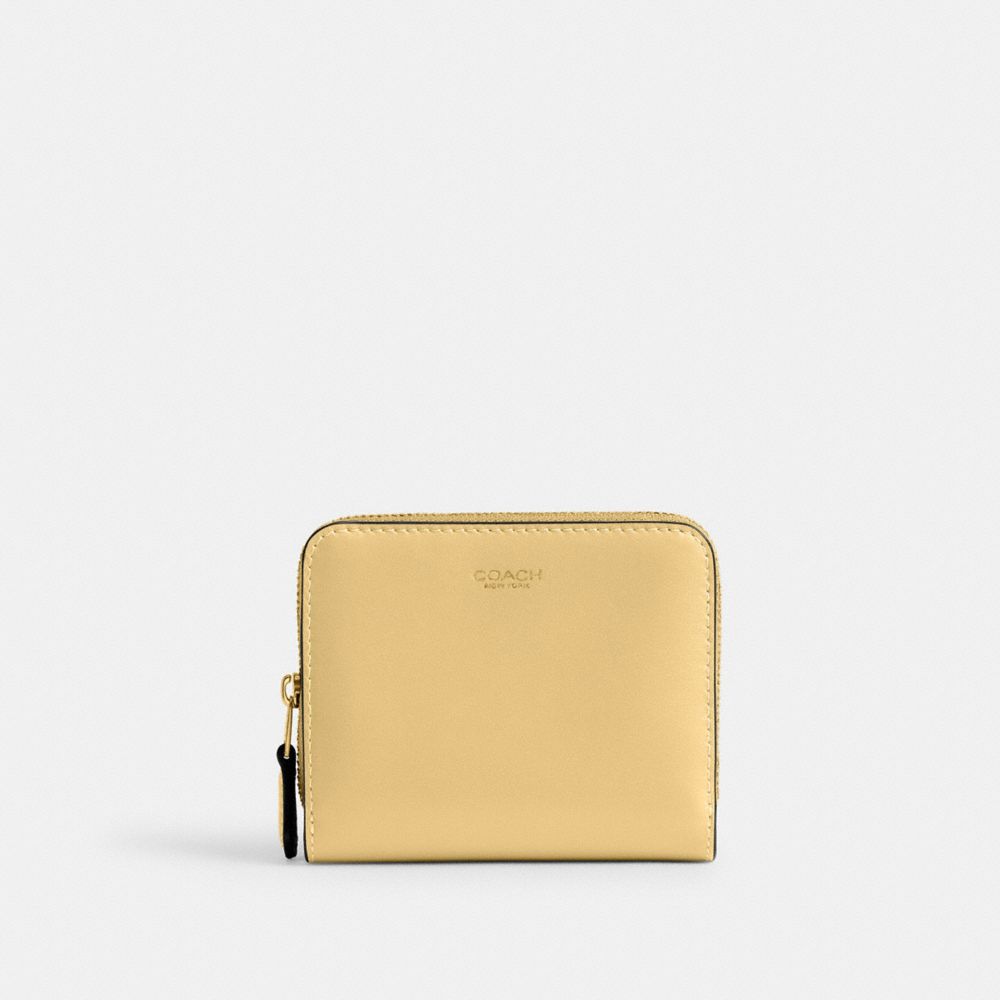 Coach New York Billfold Wallet Brass Vanilla