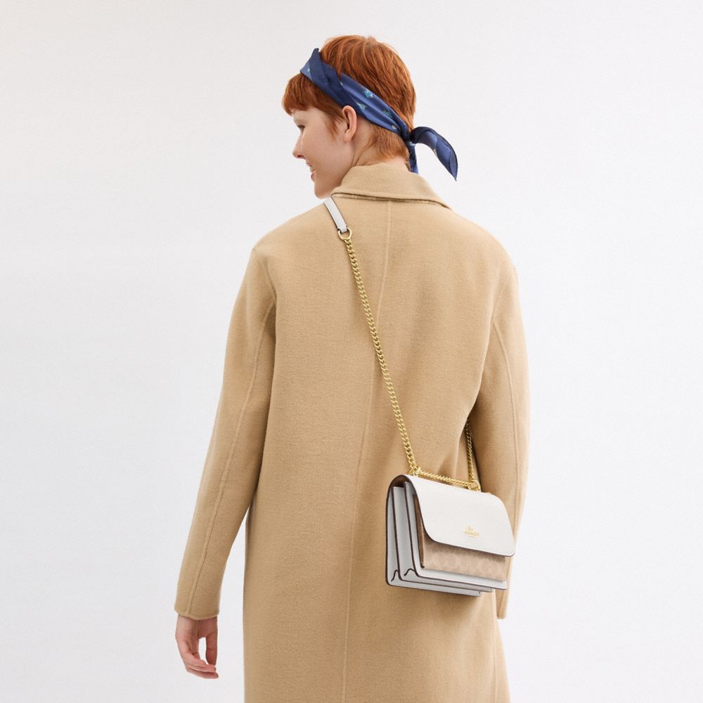 Coach Klare Crossbody Bag In Signature Canvas Gold Sand Chalk
