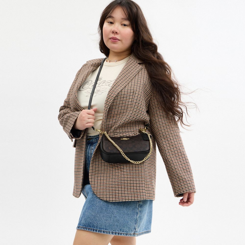 Teri Mini Crossbody Bag In Signature Canvas