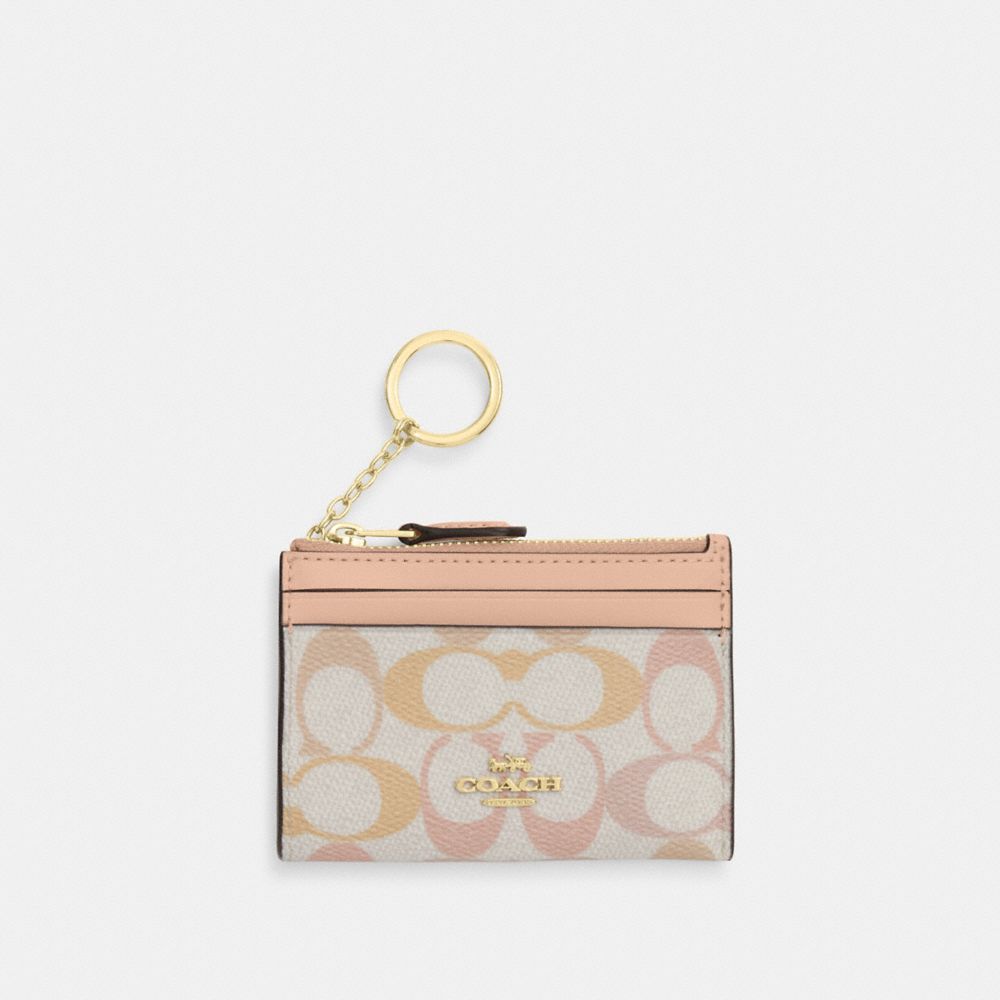Coach Mini Skinny Id Case In Signature Canvas Gold Chalk Pink