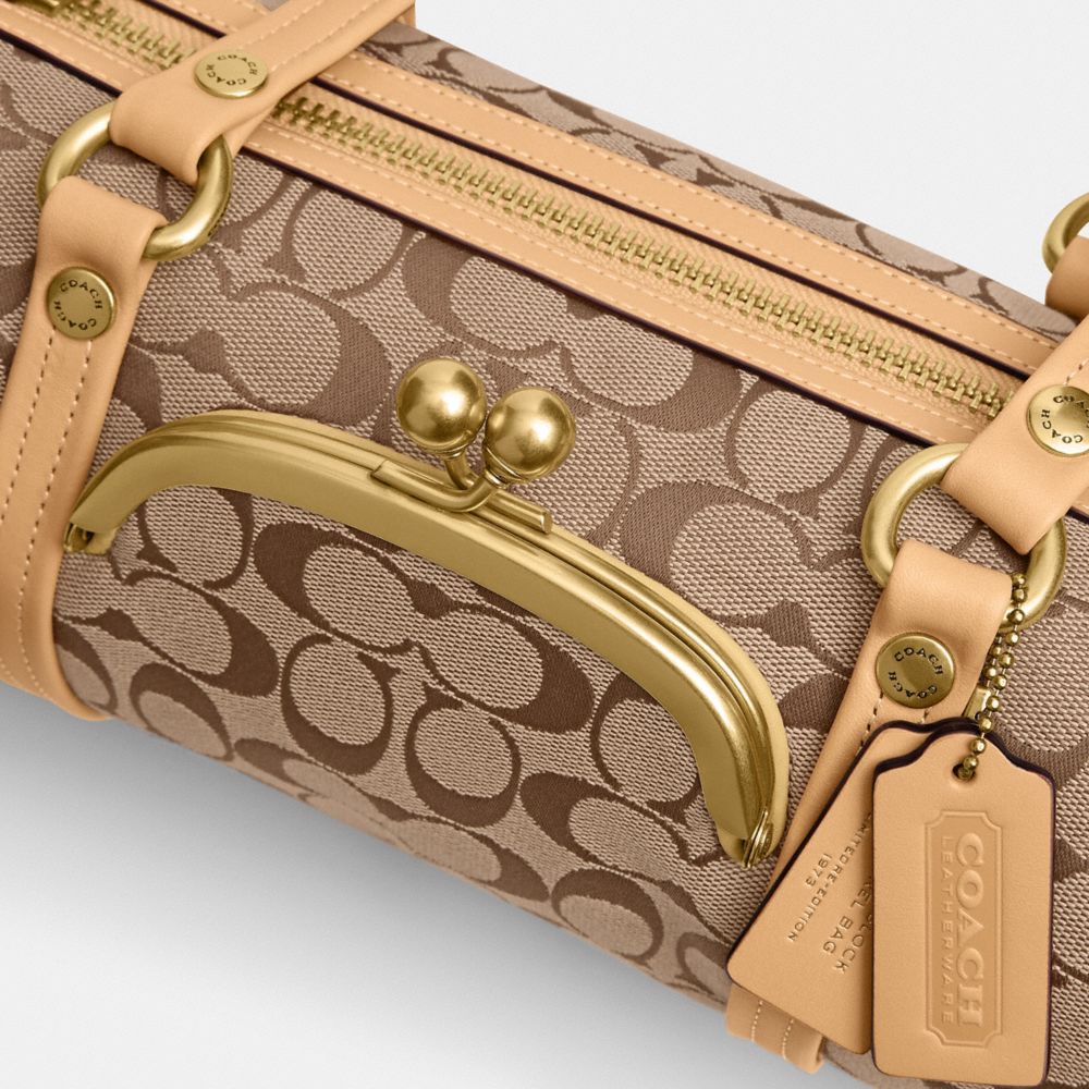Kisslock Barrel Bag 28 In Signature Jacquard
