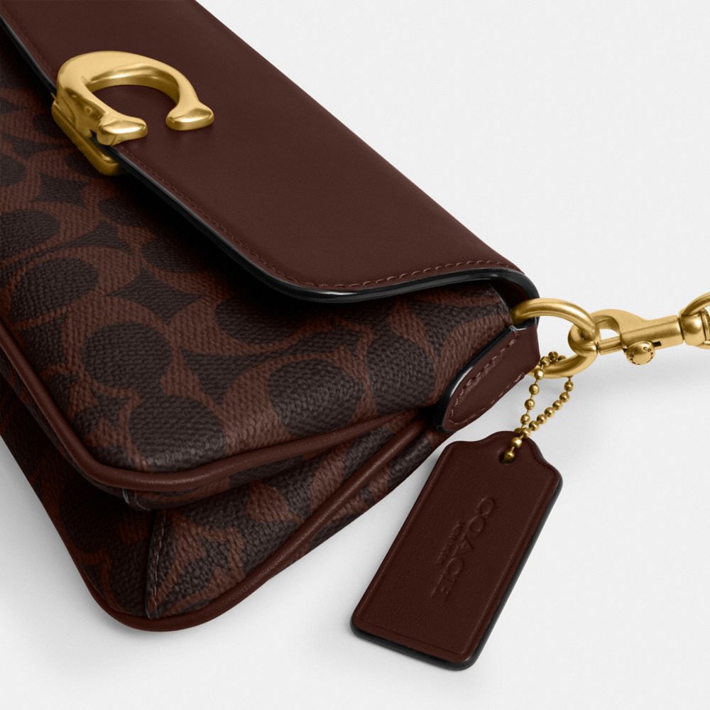 Jet Shoulder Bag In Signature Canvas