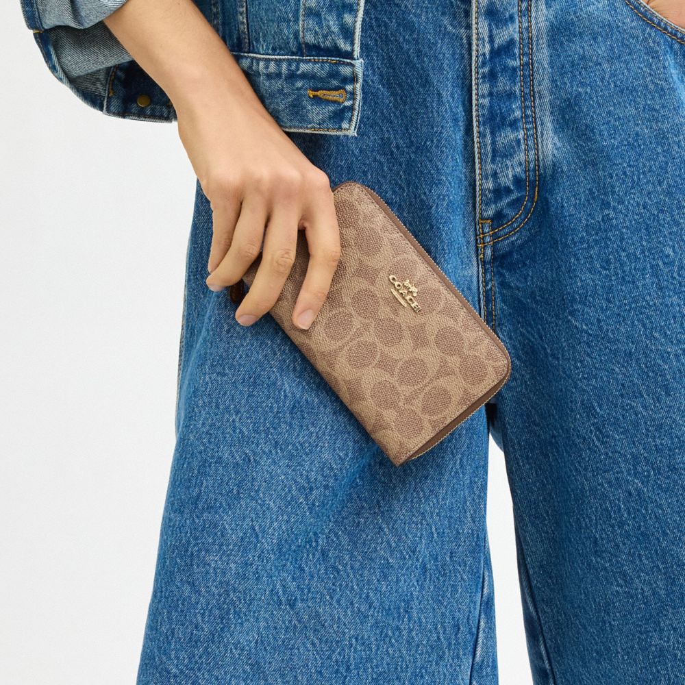Coach Medium Id Zip Wallet In Signature Canvas Gold Tan Brown