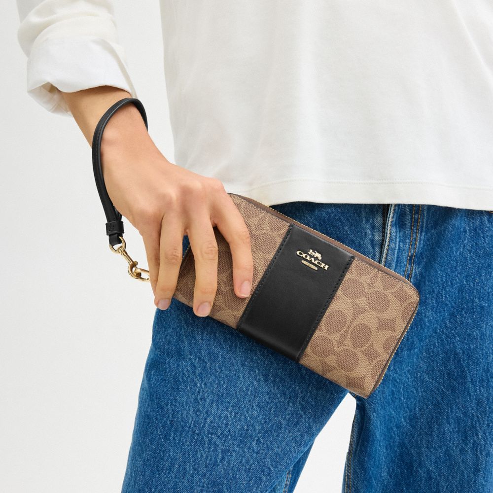 Coach Long Zip Around Wallet In Signature Canvas With Stripe Gold Tan Black