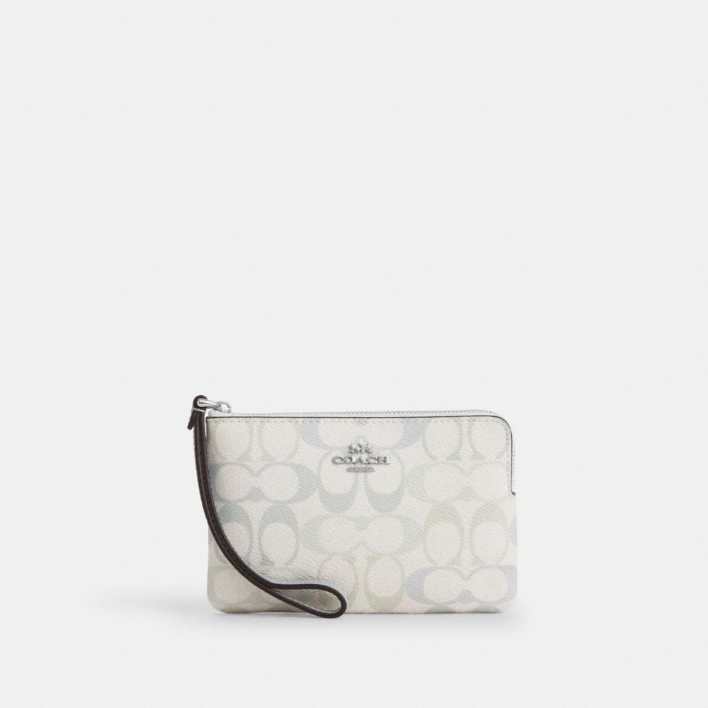 Coach Corner Zip Wristlet In Signature Canvas Silver Chalk Blue