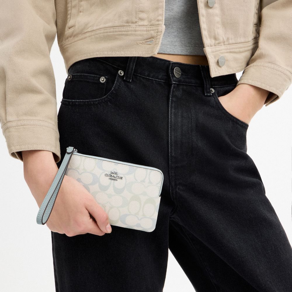 Coach Corner Zip Wristlet In Signature Canvas Silver Chalk Blue
