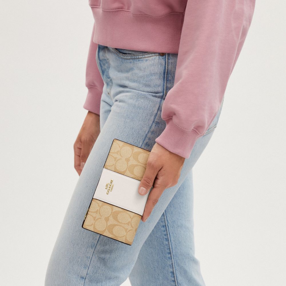 Coach Slim Zip Wallet In Signature Canvas With Stripe Gold Light Khaki Chalk Lt Saddle