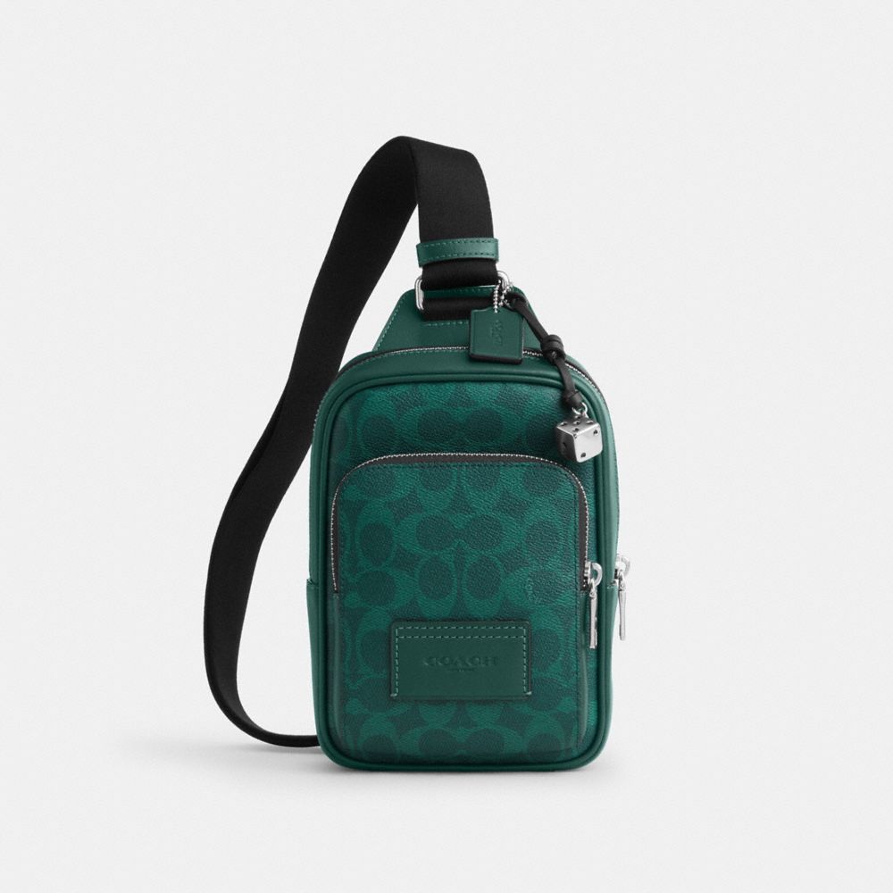 Coach Racer Sling Pack In Signature Canvas With Charms Silver Sea Green