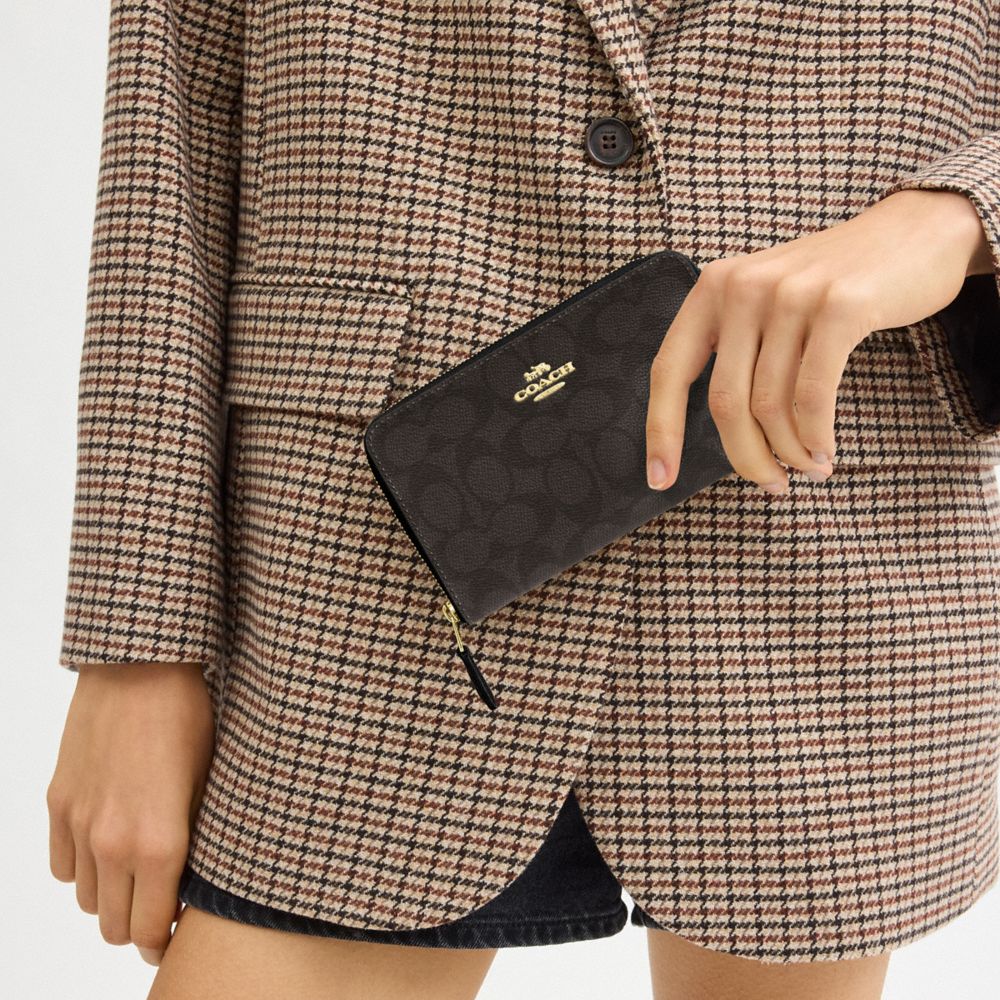 Coach Medium Id Zip Wallet In Signature Canvas Gold Walnut Black