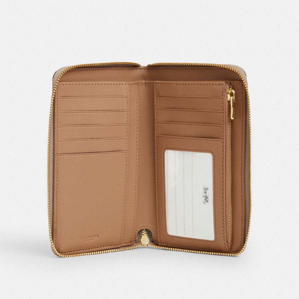 Coach Medium Id Zip Wallet In Signature Canvas Gold Sand Chalk