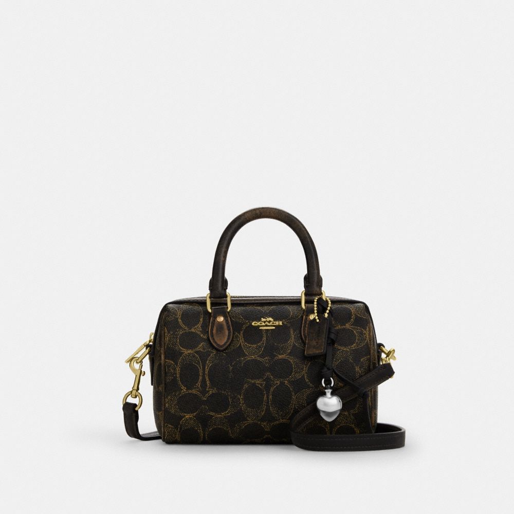 Mini Rowan Crossbody Bag In Loved Signature Canvas With Charms