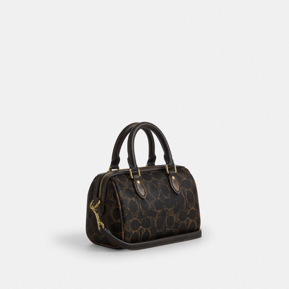 Mini Rowan Crossbody Bag In Loved Signature Canvas With Charms