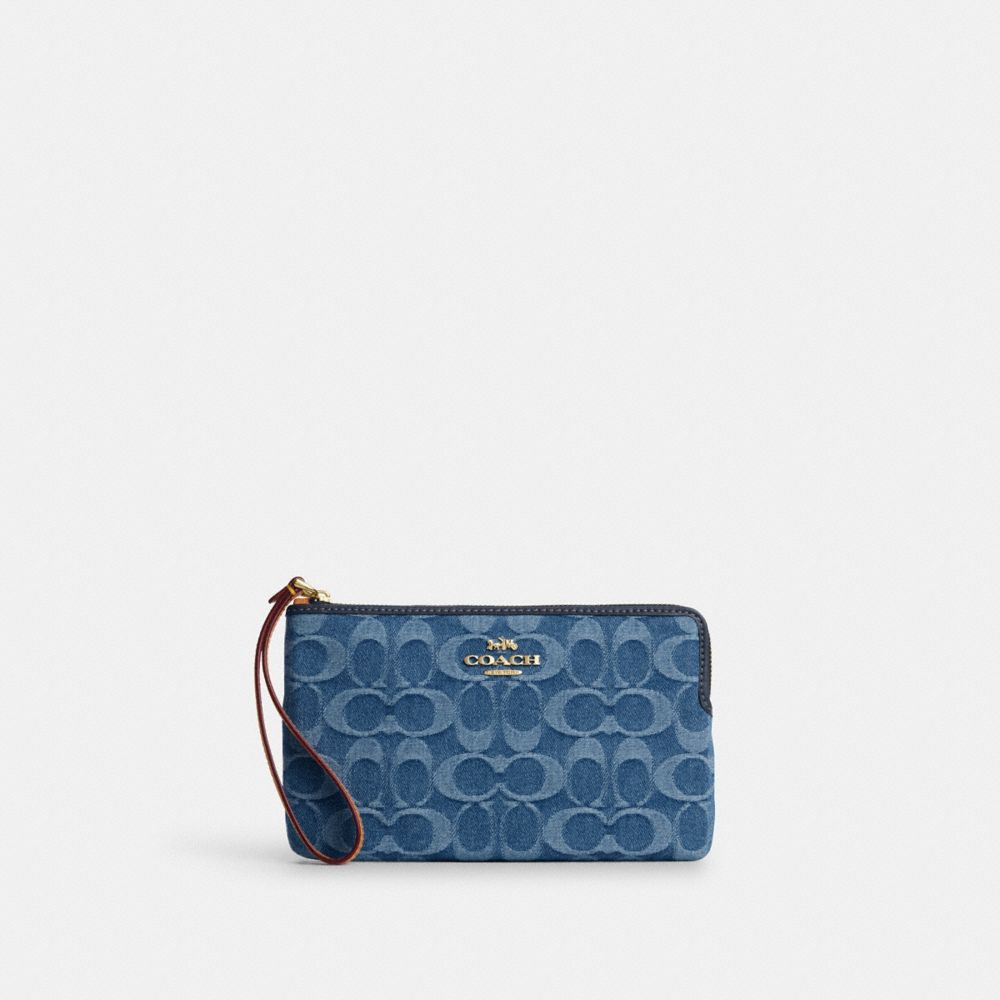 Coach Large Corner Zip Wristlet In Signature Denim Gold Indigo