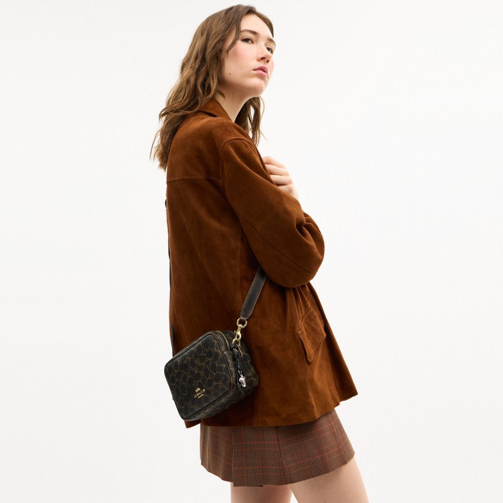 Mini Carey Crossbody Bag In Loved Signature Canvas