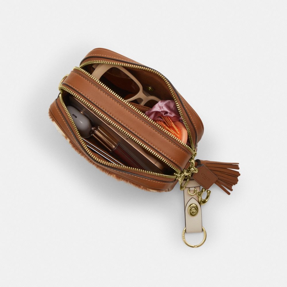 Mini Carey Crossbody Bag In Haircalf With Cow Print