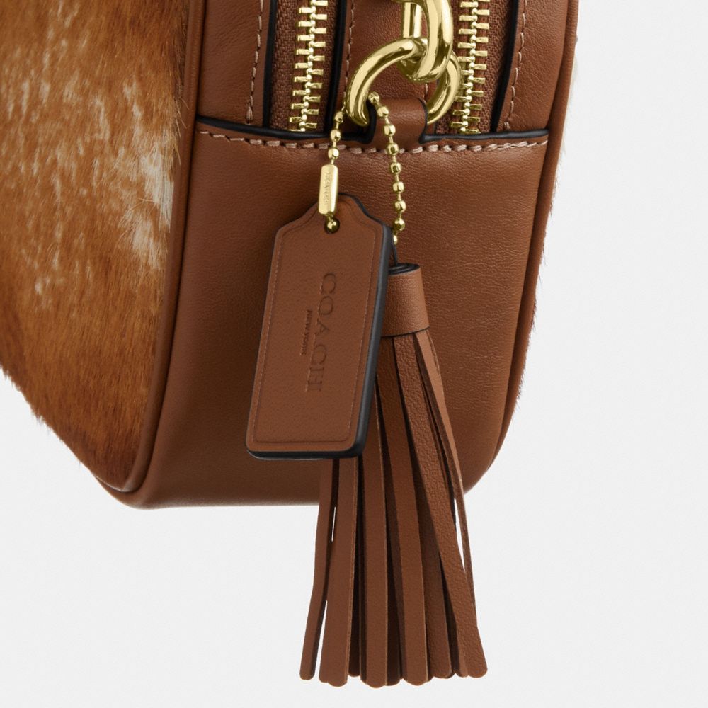 Mini Carey Crossbody Bag In Haircalf With Cow Print