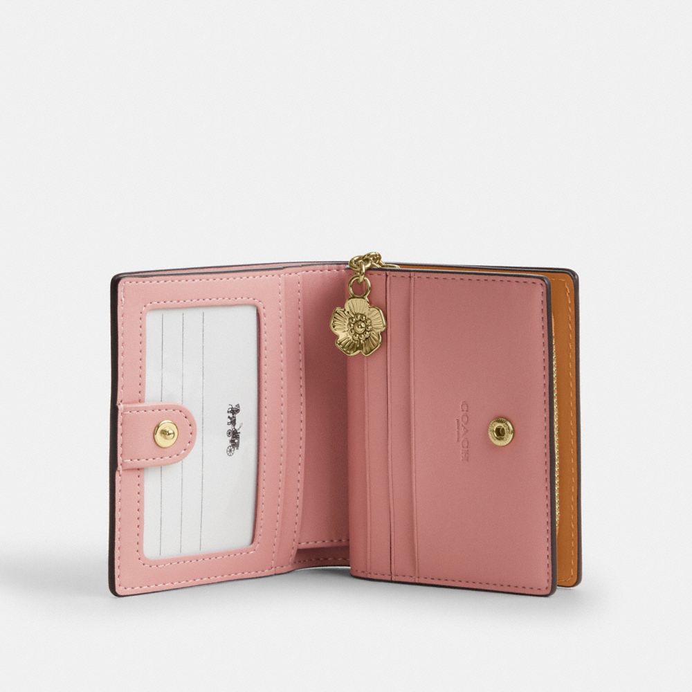Coach Snap Wallet In Signature Canvas With Charm Gold Powder Pink