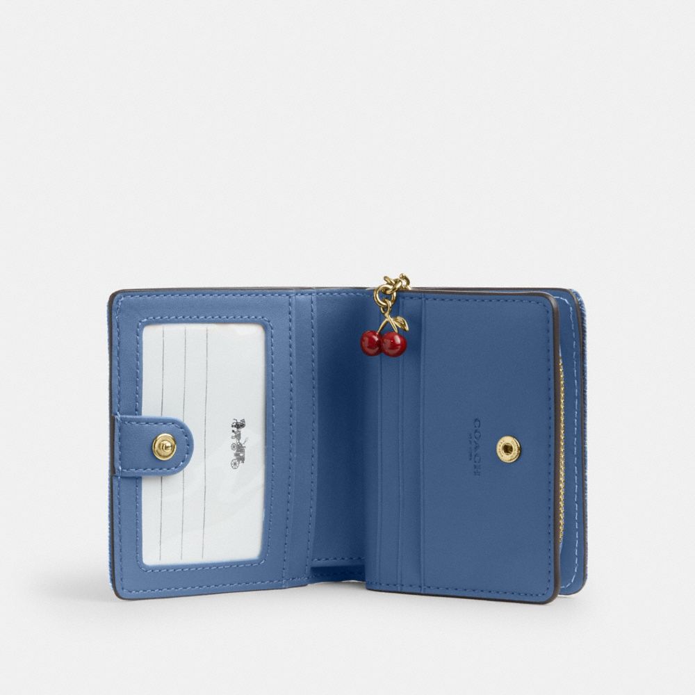 Snap Wallet In Loved Denim With Charm