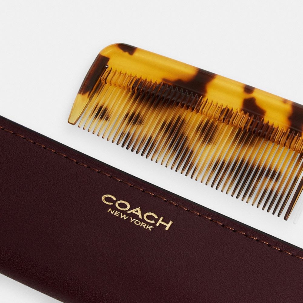 Comb With Sleeve