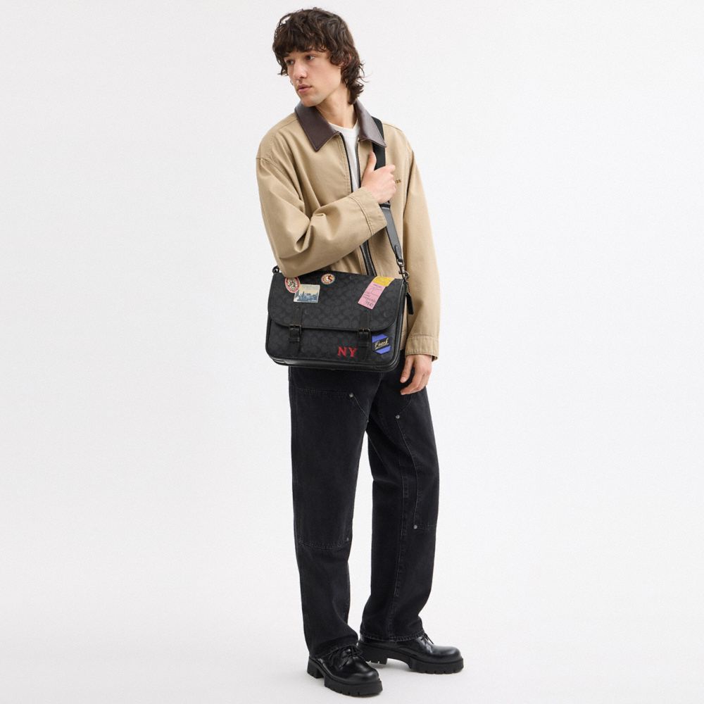 Hitch Messenger Bag In Signature Canvas With Patches