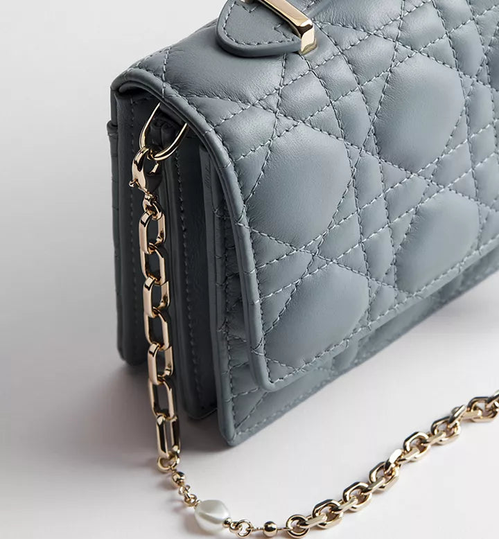 Cloud-blue lambskin with Cannage motif