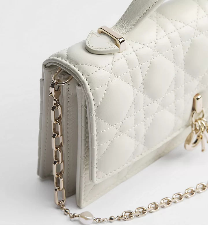 Latte-colored lambskin with Cannage motif