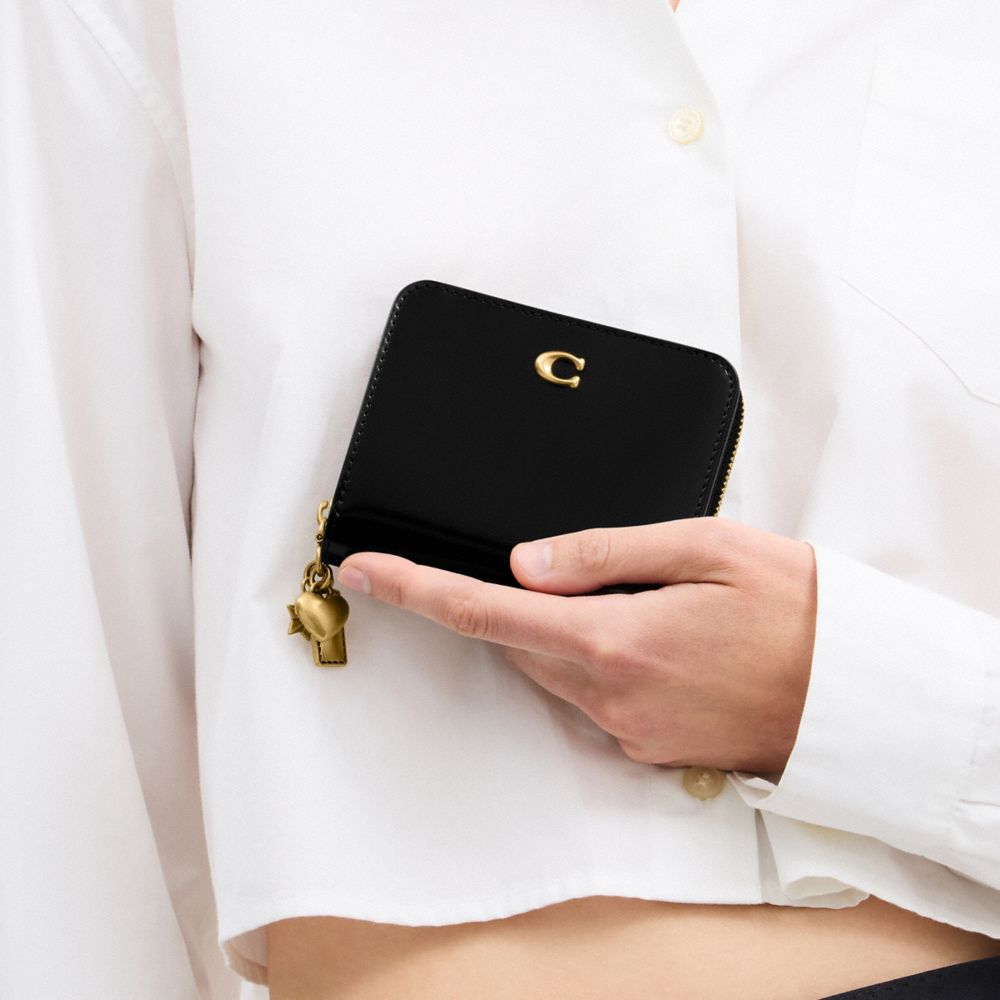 Coach Essential Billfold Wallet With Charms Brass Black