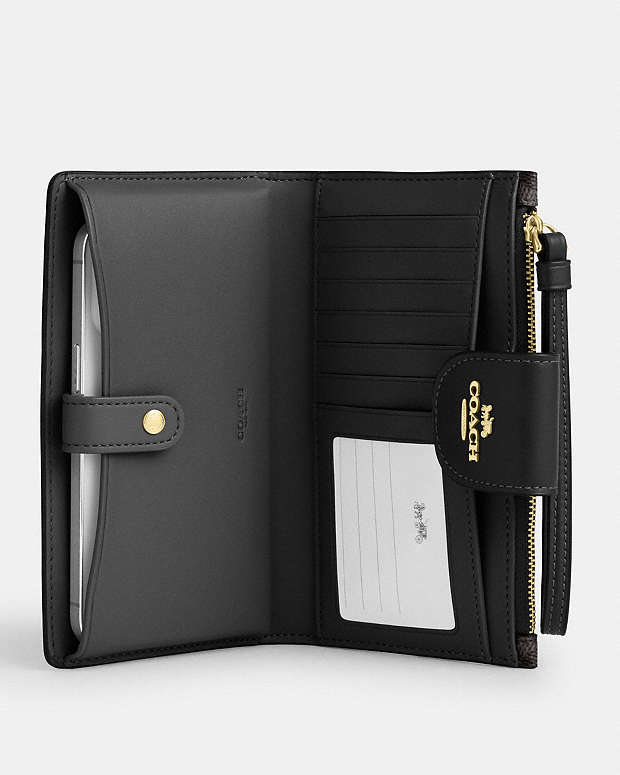 Coach Phone Wallet In Signature Canvas Signature Canvas-Gold-Walnut-Black