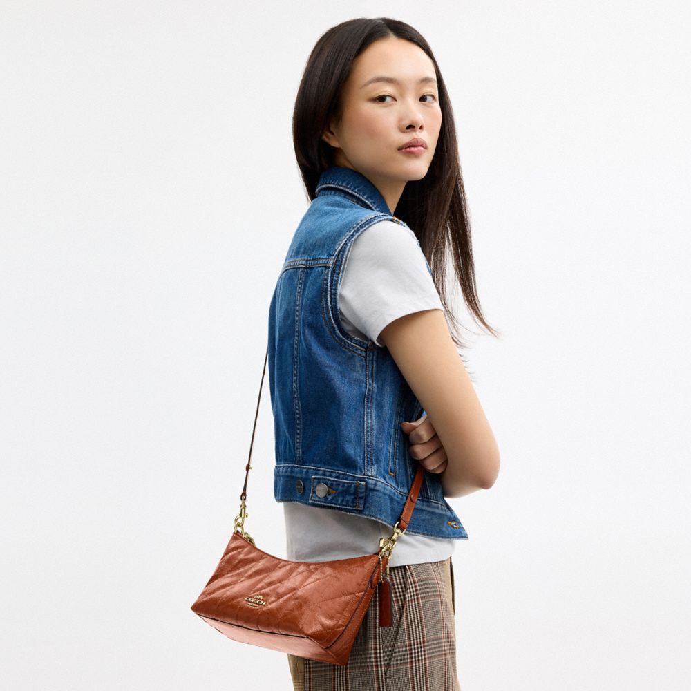 Coach Caitlin Shoulder Bag With Quilting And Charm Gold Cinnamon