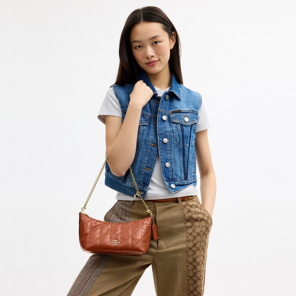 Coach Caitlin Shoulder Bag With Quilting And Charm Gold Cinnamon