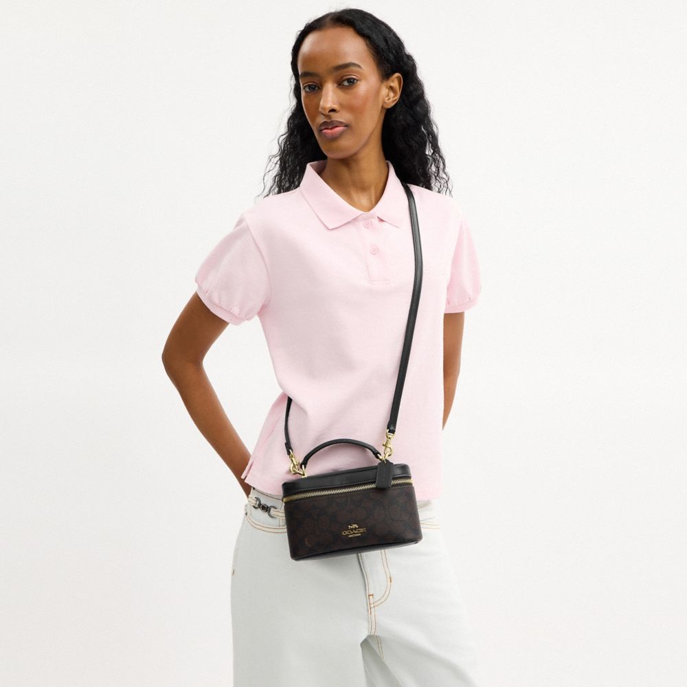 Coach Rainer Crossbody Bag 18 In Signature Canvas Gold Walnut Black