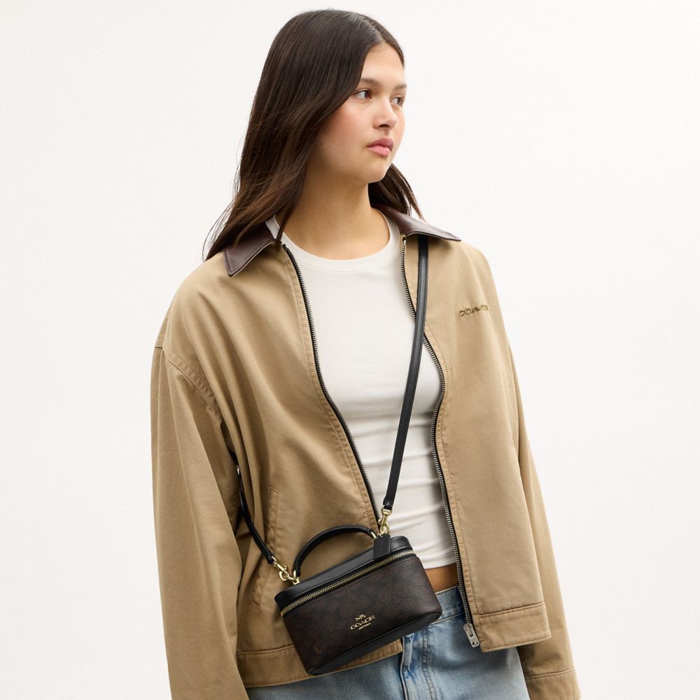 Coach Rainer Crossbody Bag 18 In Signature Canvas Gold Walnut Black