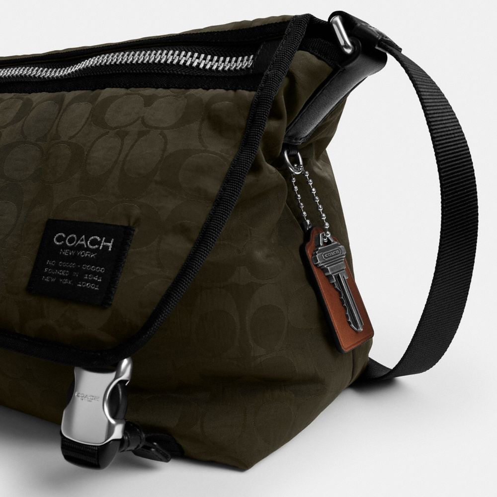 Coach Lane Messenger In Signature Nylon Dark Moss