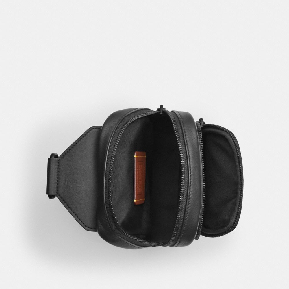 Coach Racer Sling Pack In Signature Canvas Matte Black Black Signature