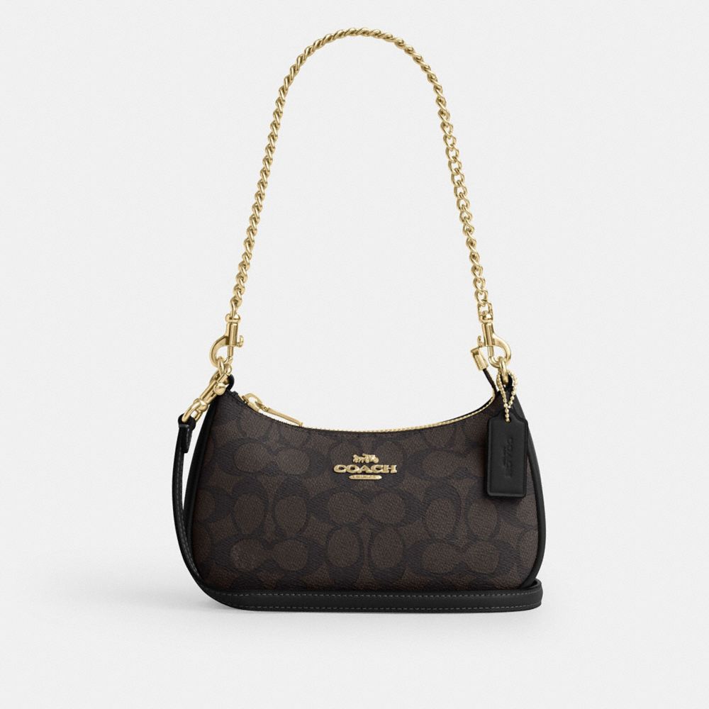 Teri Mini Crossbody Bag In Signature Canvas