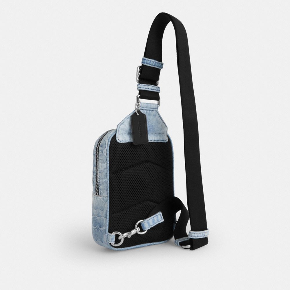 Racer Sling Pack In Loved Signature Denim