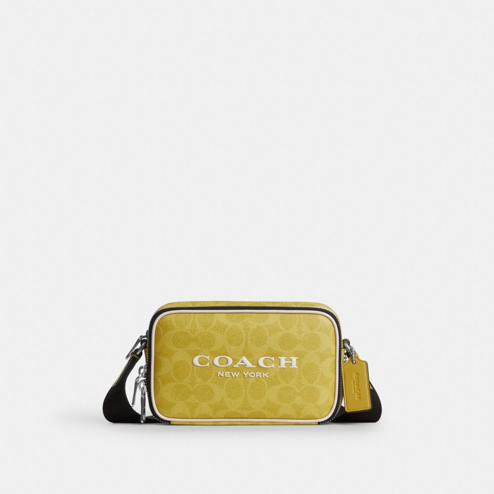 Colton Crossbody Bag 19 In Signature Canvas With Coach Graphic