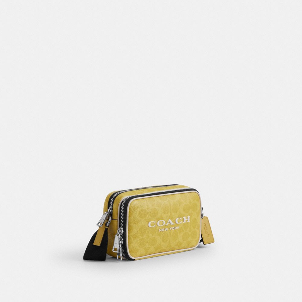 Colton Crossbody Bag 19 In Signature Canvas With Coach Graphic