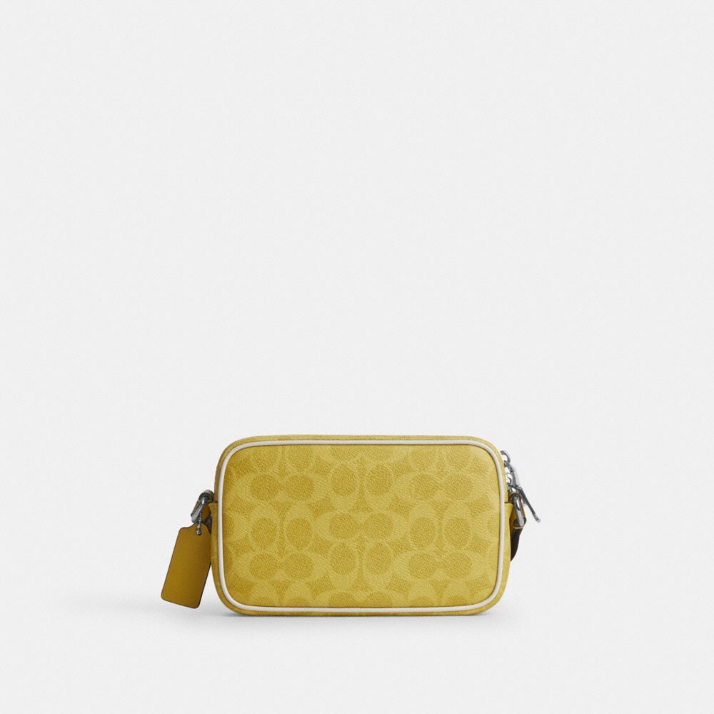 Colton Crossbody Bag 19 In Signature Canvas With Coach Graphic
