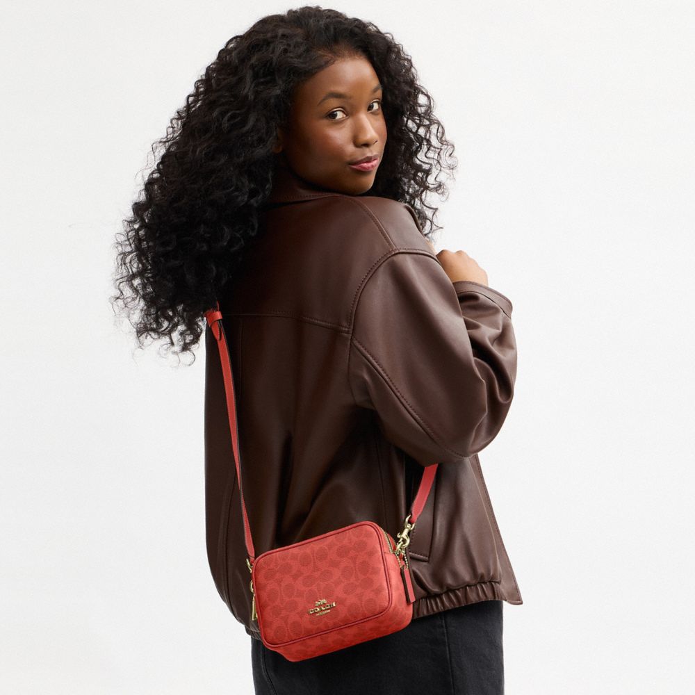 Coach Mini Carey Crossbody Bag In Signature Canvas Gold Crimson