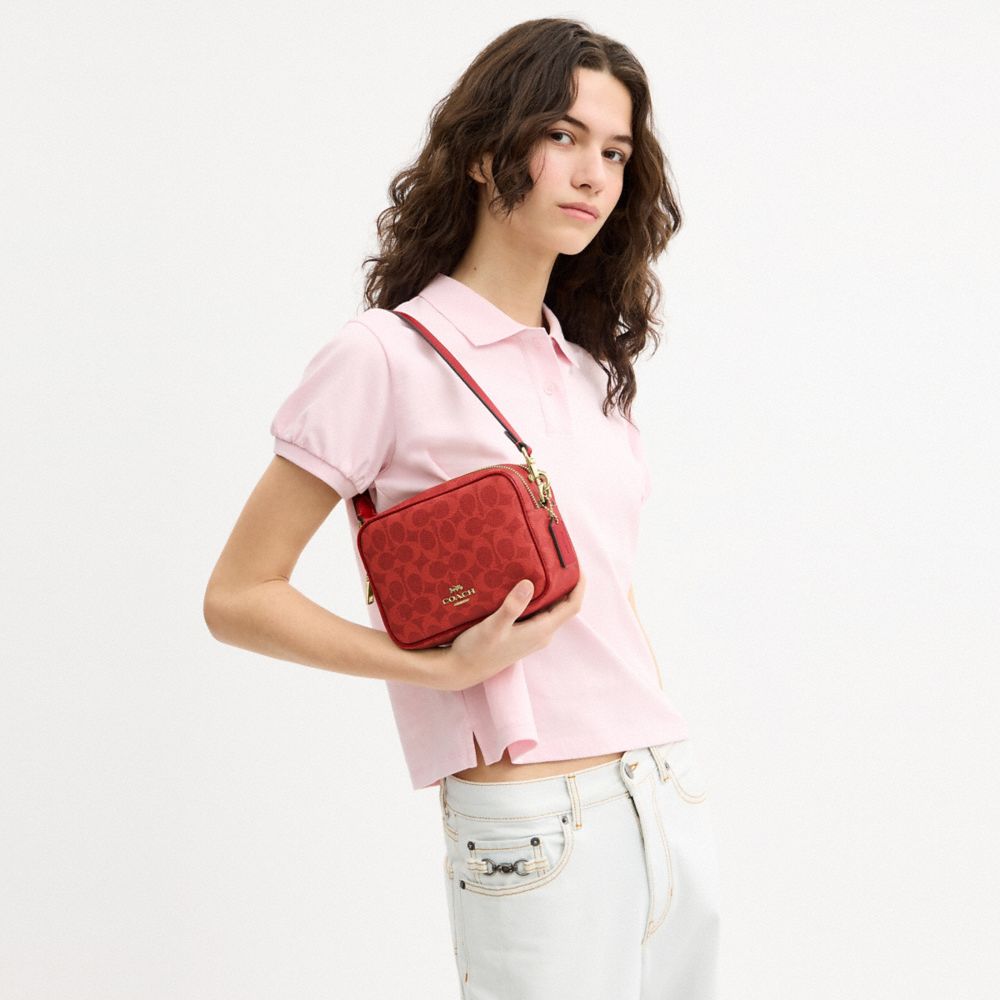 Coach Mini Carey Crossbody Bag In Signature Canvas Gold Crimson
