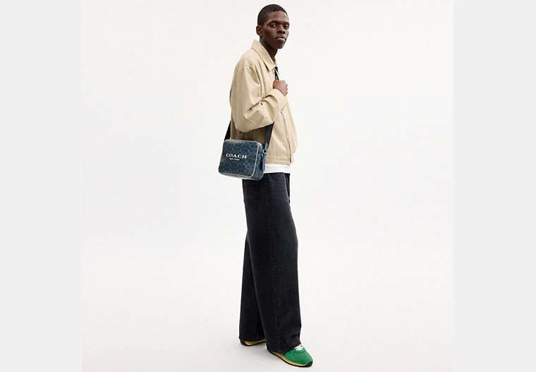 Colton Crossbody Bag 25 In Signature Canvas With Coach Graphic
